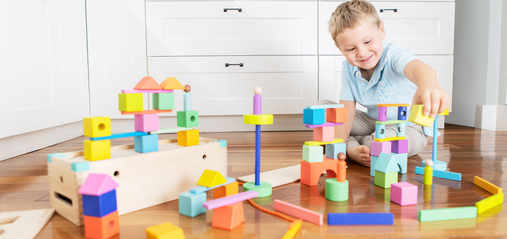 boy playing with blockset