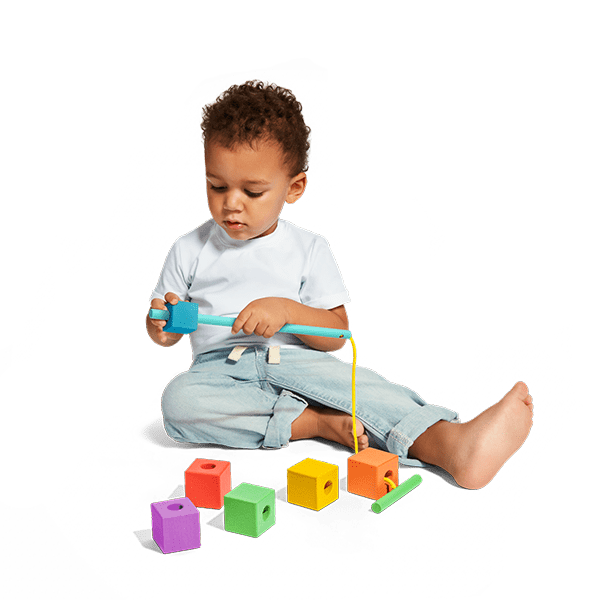 Explore connections and pattern play by threading blocks of different colours.